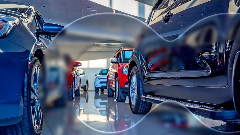Keyloop branded image with the inside of a car dealership behind the main graphic